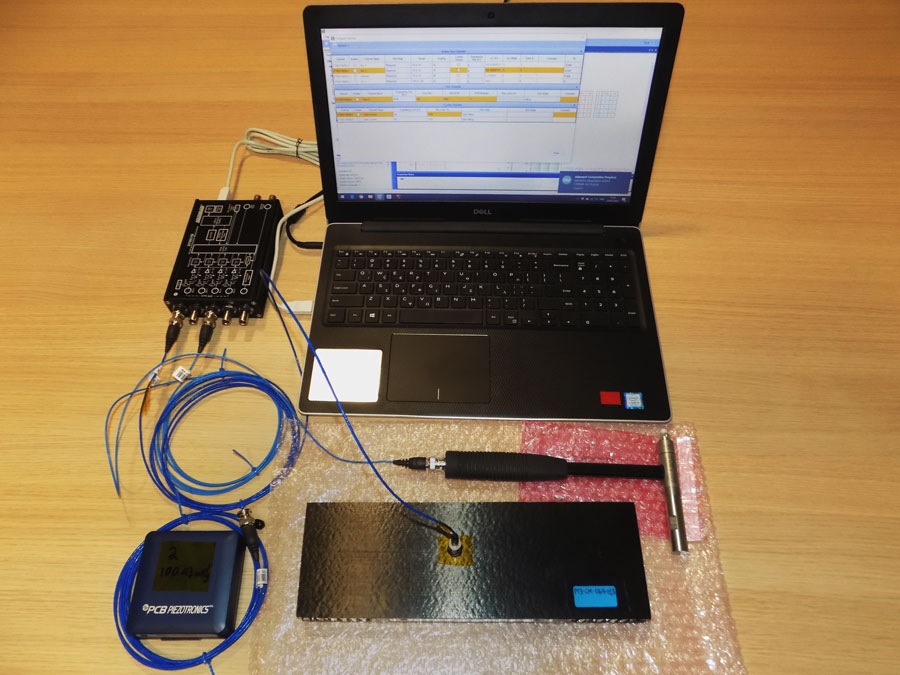 Laptop connected with testing accessories
